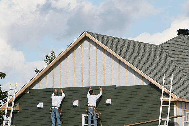 Professional Storm Damage Siding Repair technician working in Cheshire, CT